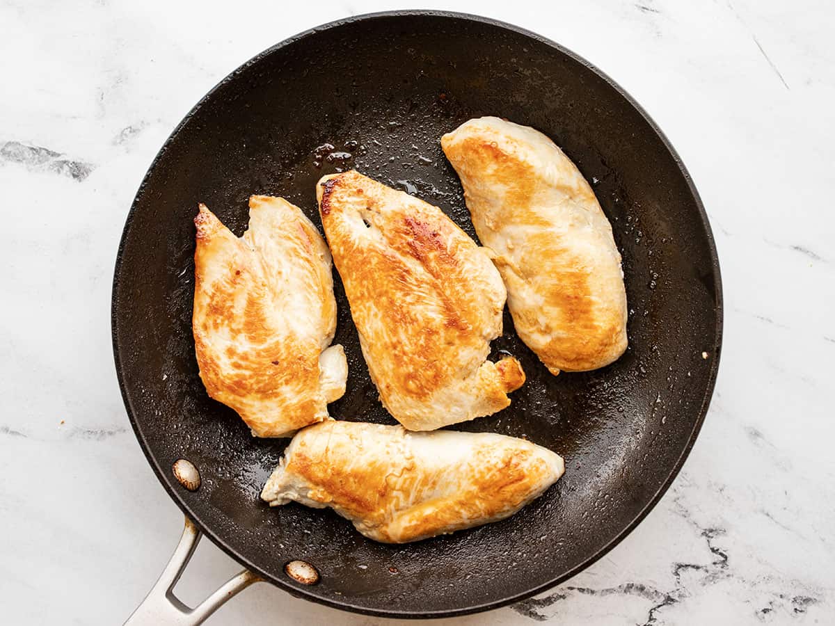 Cooked chicken breast in a skillet