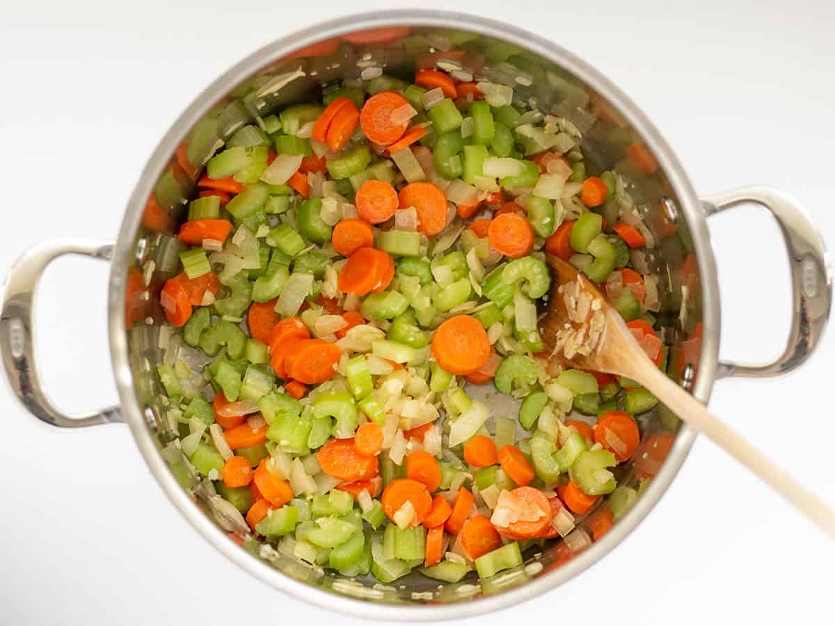 Carrot and celery added to the soup pot.