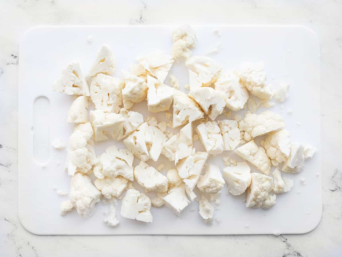 Cauliflower chopped on a cutting board