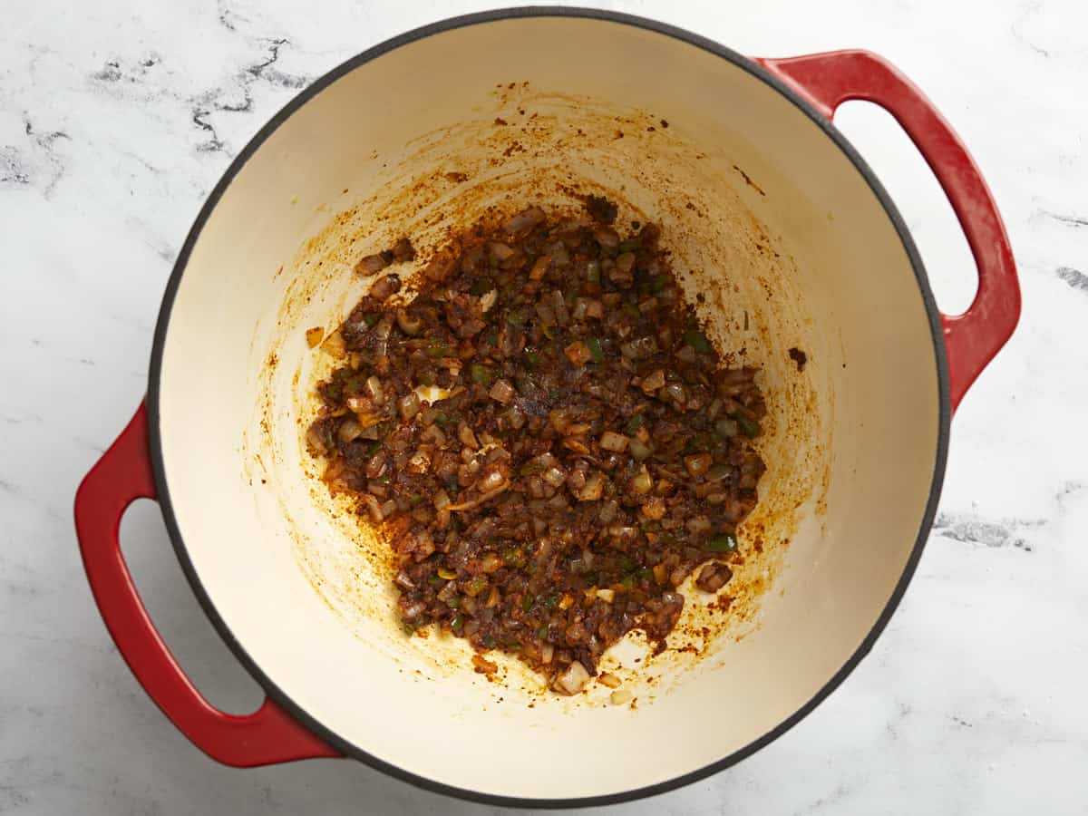 Spices mixed and sautéed in dutch oven.