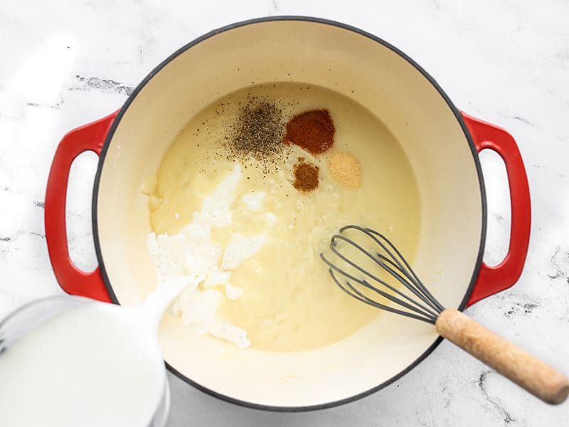 Whisk in milk and spices