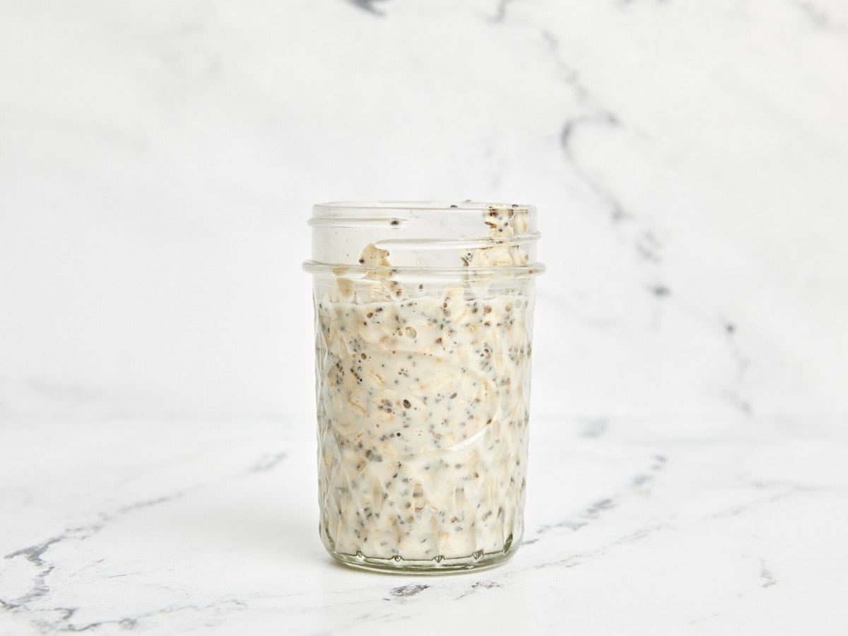 Overnight oats in a mason jar before being refrigerated