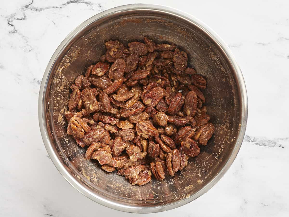 Pecans coated in egg, cinnamon, and sugar. 