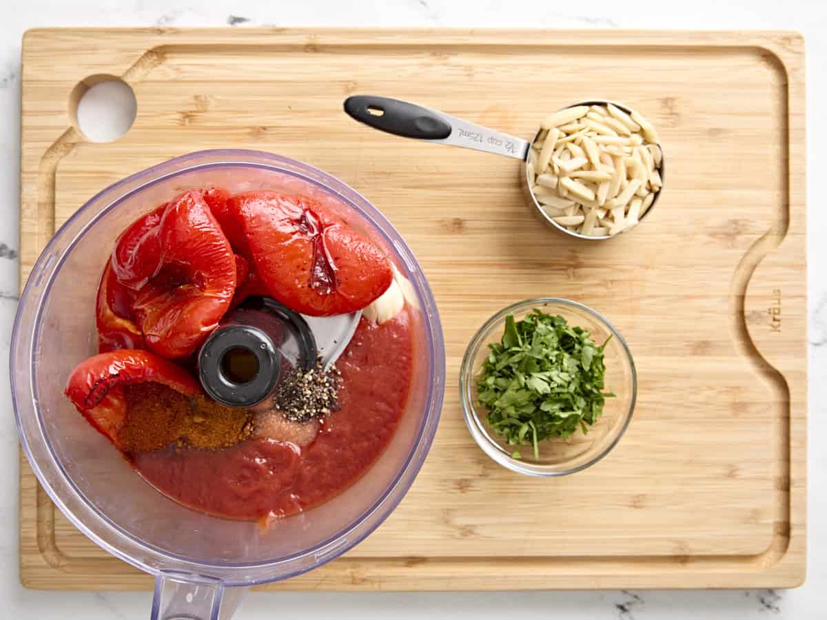 Ingredients for romesco sauce in a food processor