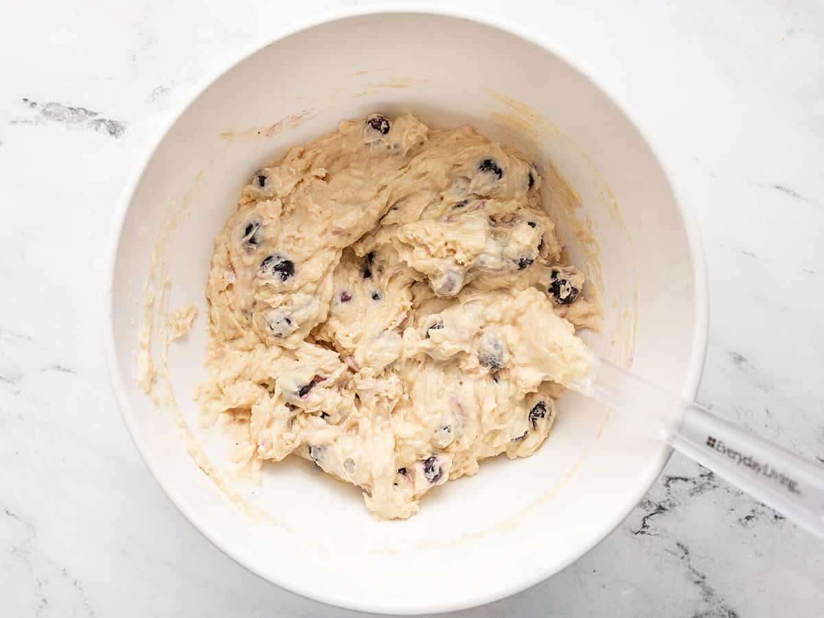 Blueberries stirred into the muffin batter.