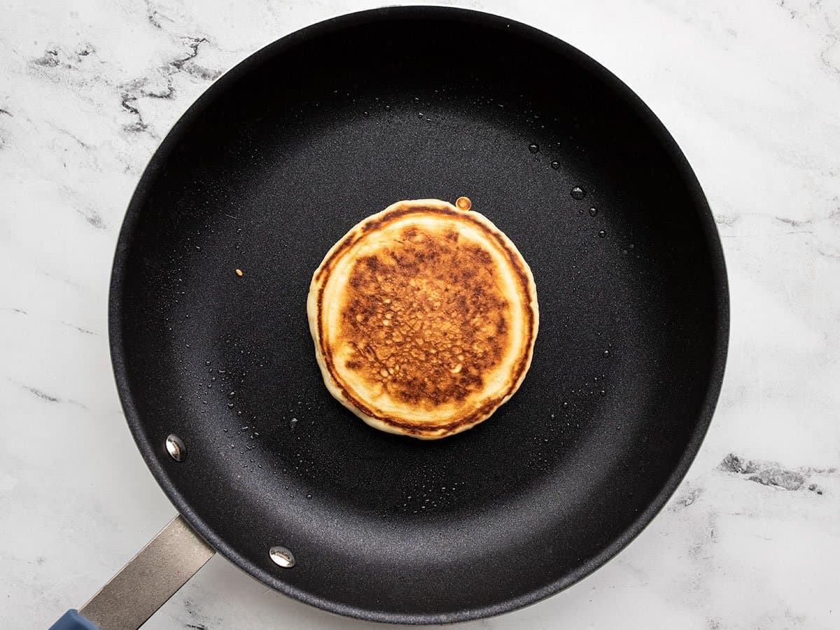 Flipped pancake in the skillet.