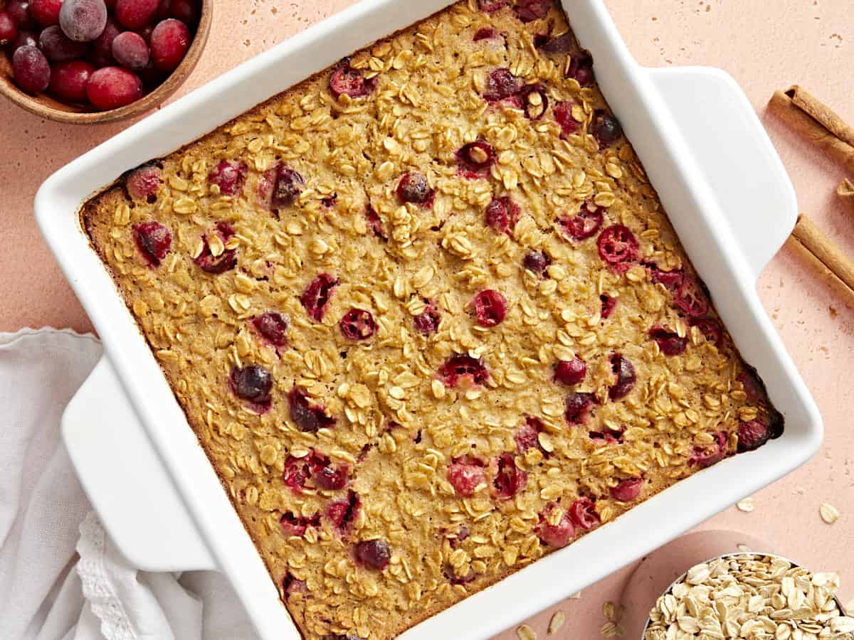 Overhead view of cranberry apple baked oatmeal in the casserole dish, freshly baked. 