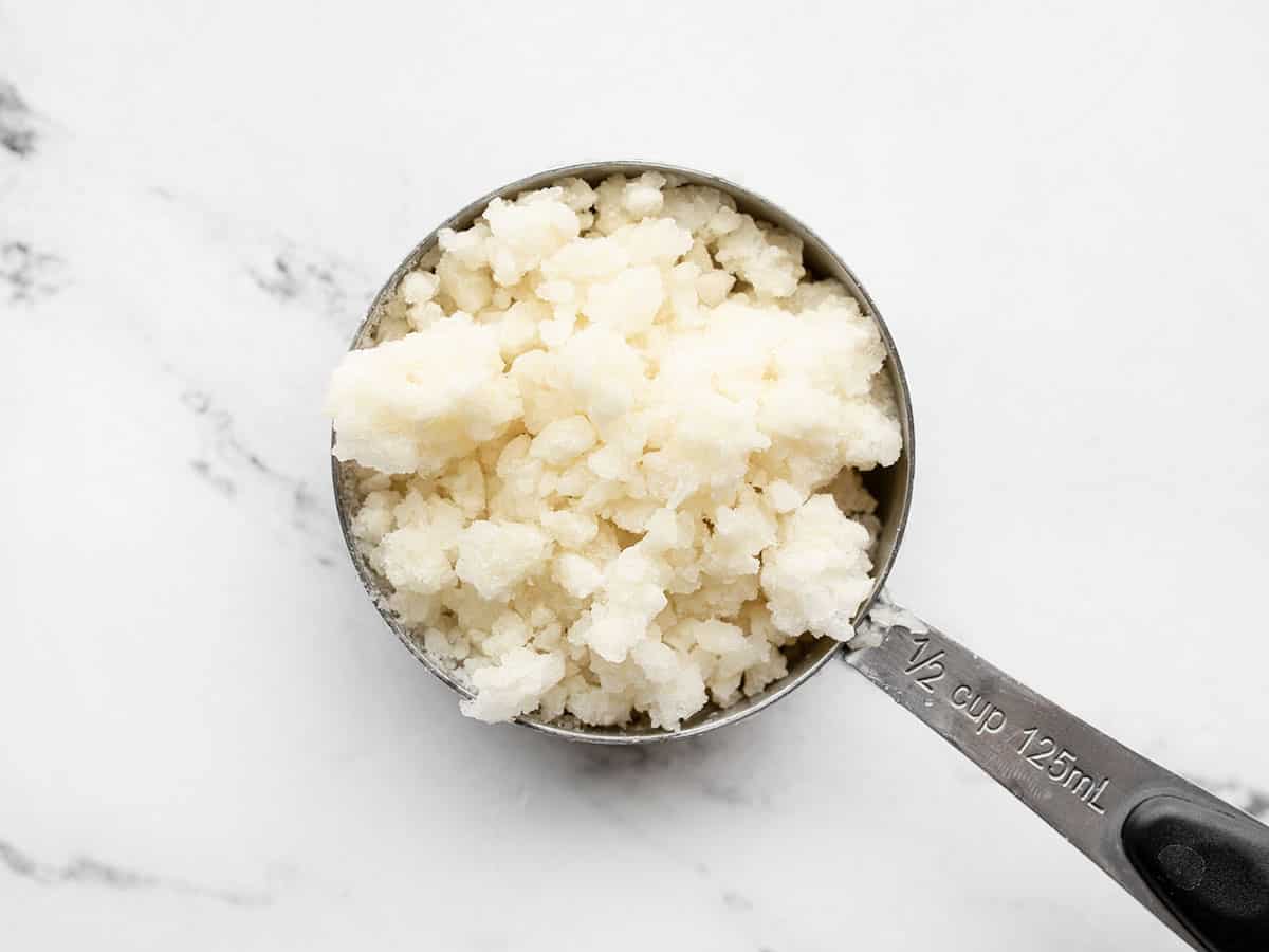 Cauliflower Rice in a measuring cup