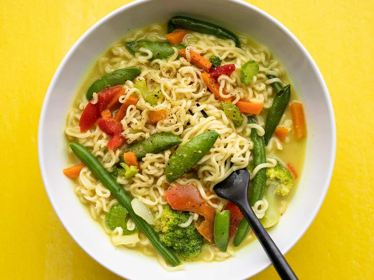 Close up overhead view of a bowl of coconut curry ramen