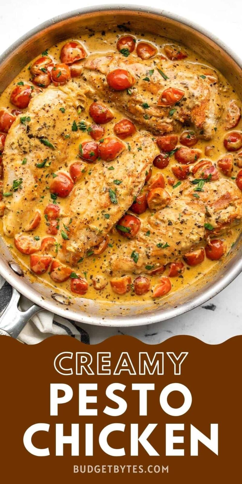 Overhead view of creamy pesto chicken in the skillet.