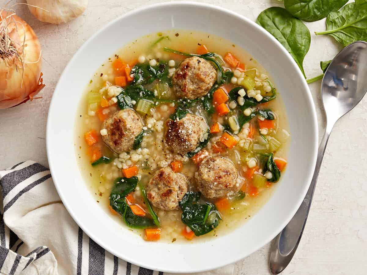 Overhead view of a bowl full of Italian Wedding Soup.