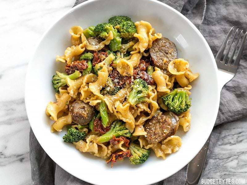 This One Pot Sausage and Sun Dried Tomato Pasta cooks quickly and in one skillet so that no flavor is lost! Make dinner fast, easy, and delicious. BudgetBytes.com