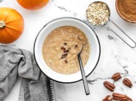 Overhead view of pumpkin pie overnight oats in the bowl