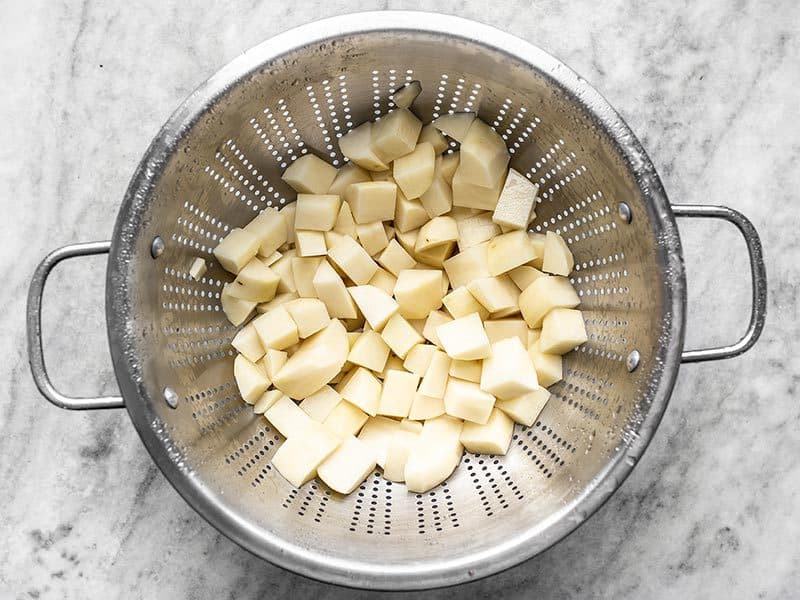 Peel Dice and Rinse Potatoes