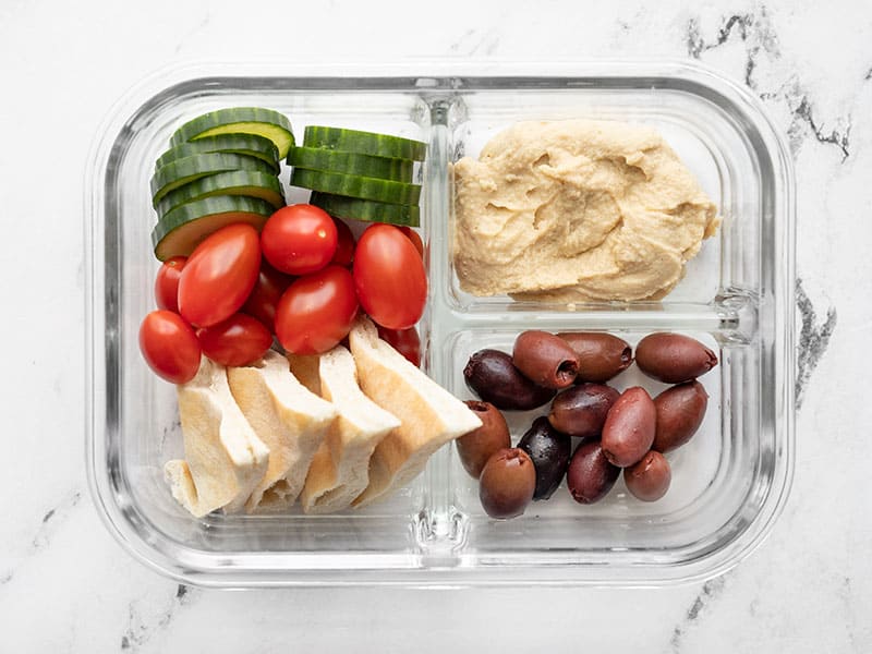 Overhead view of one hummus lunch box.