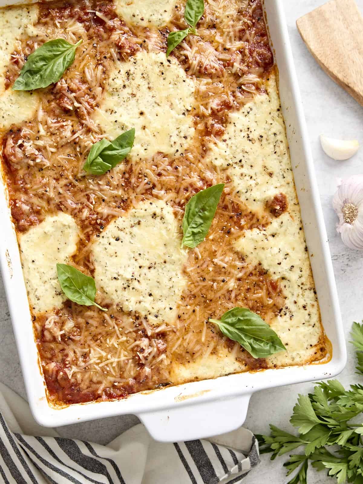 Overhead view of zucchini lasagna in a baking dish