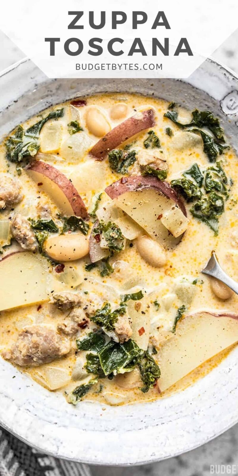 close up view of a bowl of zuppa toscana with title text at the top